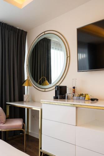 Телевизор и/или развлекательный центр в Casa Cuarzo Hotel Boutique