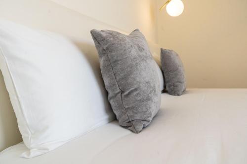Кровать или кровати в номере Casa Cuarzo Hotel Boutique