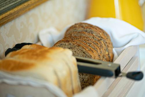 two slices of bread in a bread machine at Kings Lodge in Torquay