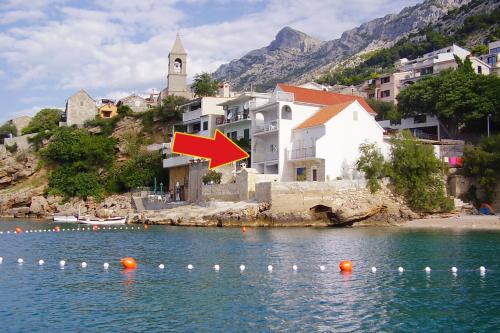 Apartments by the sea Pisak, Omis - 1003