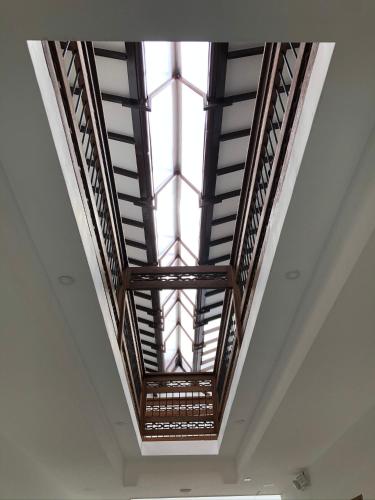 a ceiling in a building with a window at Casa Isabel Hotel in Jardin