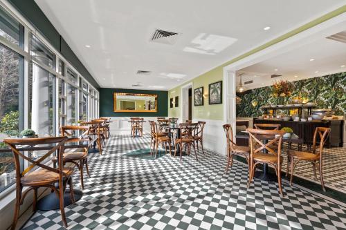 a restaurant with tables and chairs in a room at Lilianfels Blue Mountains Resort & Spa in Katoomba