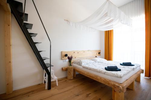 Postel nebo postele na pokoji v ubytování Pila Kvilda