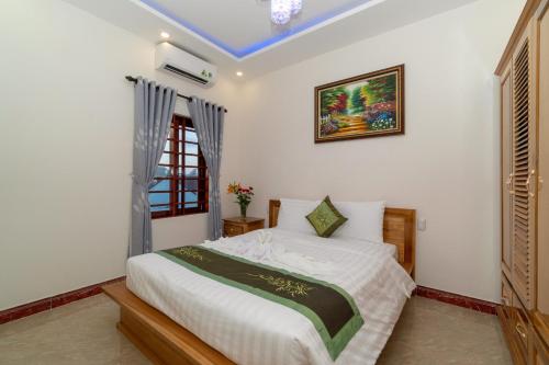Postel nebo postele na pokoji v ubytování Legend Connect Homestay