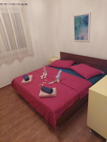 Apartments with parking space Palit, Rab - 18900