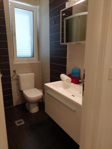 Apartments with parking space Palit, Rab - 18900