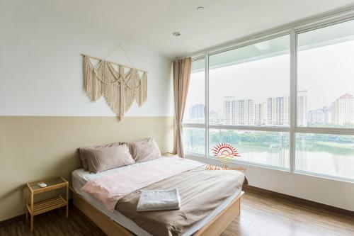 Postel nebo postele na pokoji v ubytování SETAPAK CENTRAL KL-zeta suite by ALOHA