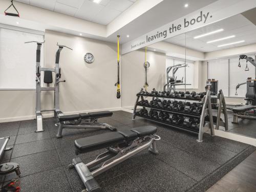 a fitness room with treadmills and weights at EVEN Hotel Seattle Downtown - Lake Union by IHG in Seattle