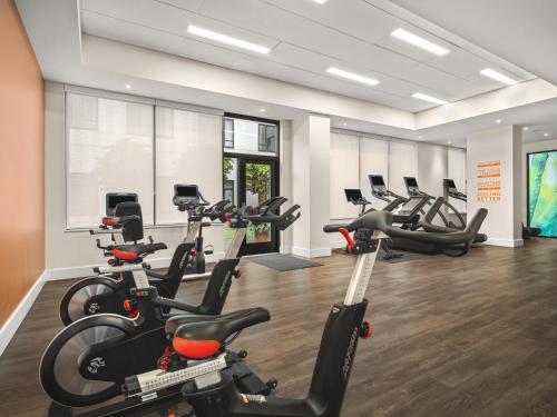 a gym with a bunch of exercise bikes in it at EVEN Hotel Seattle Downtown - Lake Union by IHG in Seattle