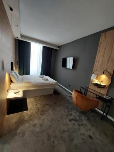 Кровать или кровати в номере A8 b&b