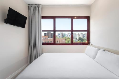 Postel nebo postele na pokoji v ubytování B&B HOTEL Madrid Fuenlabrada