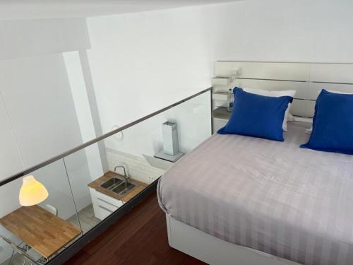 Postel nebo postele na pokoji v ubytování Das blaue Haus