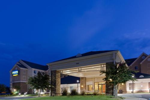 a rendering of a building at night at Staybridge Suites Chantilly Dulles Airport by IHG in Chantilly
