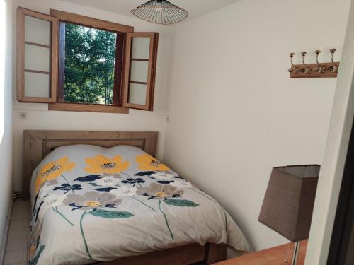 Katil atau katil-katil dalam bilik di Gîte du moulin de Vandon