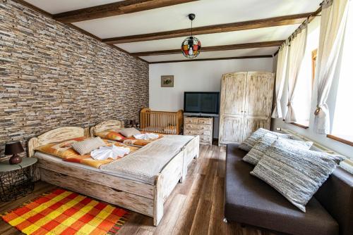 Una cama o camas en una habitación de Penzión Aurel