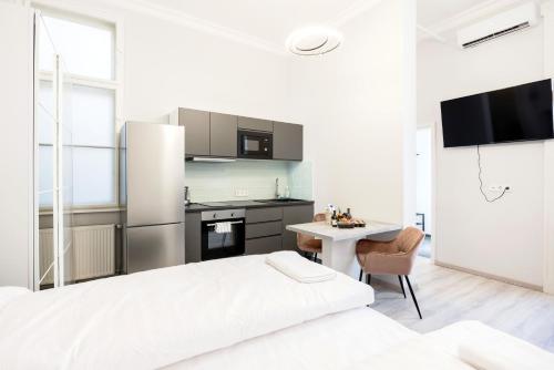 A kitchen or kitchenette at Prime Star Fashion street modern luxury apartments