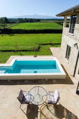 Kolam renang di atau dekat dengan The Landing Nanyuki Country Homes