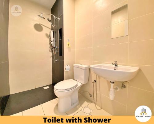 a bathroom with a toilet and a sink at Pacific Home Petaling Jaya @ The Curve, 1 Utama, Universiti Malaya in Petaling Jaya