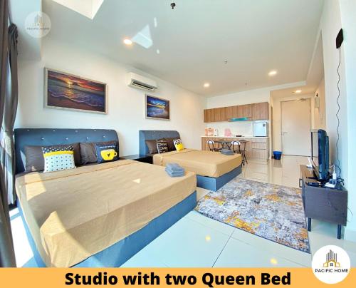 a bedroom with two queen beds and a kitchen at Pacific Home Petaling Jaya @ The Curve, 1 Utama, Universiti Malaya in Petaling Jaya