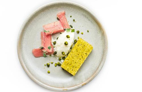 a plate of food with a piece of food on it at Kimpton Blythswood Square Hotel & Spa by IHG in Glasgow