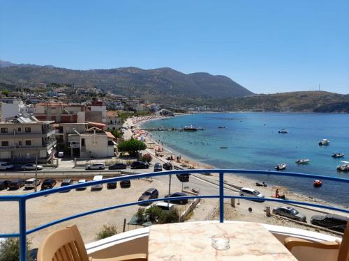 a view of a beach from a balcony at Room with amazing sea view in Himare