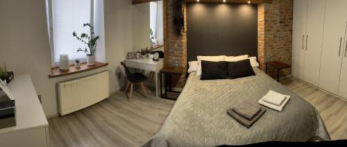 Postel nebo postele na pokoji v ubytování Apartament Centrum Bodzentyńska, centrum Rynek, bezpłatny parking