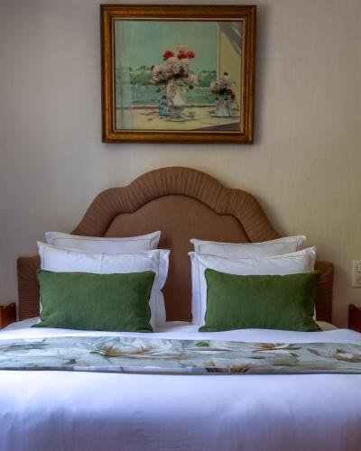 Katil atau katil-katil dalam bilik di Hotel Restaurant Le Centenaire