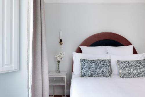 Cama o camas de una habitación en Numa Rome Portico