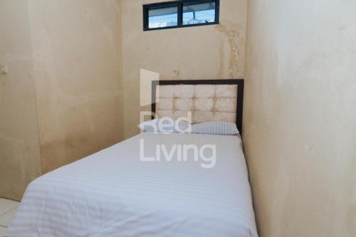 Katil atau katil-katil dalam bilik di KORPRI Live House RedPartner