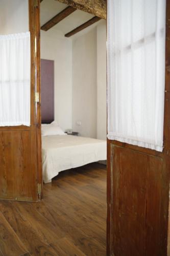 Krevet ili kreveti u jedinici u okviru objekta Precioso apartamento en el casco histórico