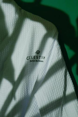 a close up of a white shirt with a classicum label on it at Celestino Boutique Hotel & Spa in Medellín