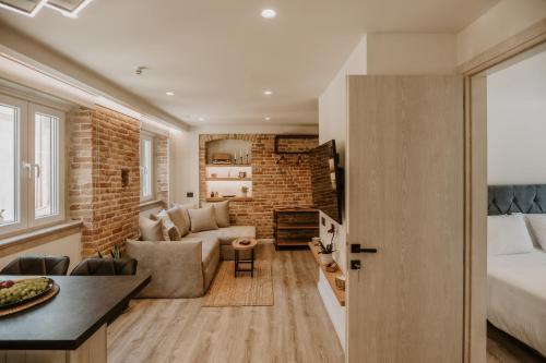 Et opholdsområde på Palazzino Veneziano Luxury Apartment