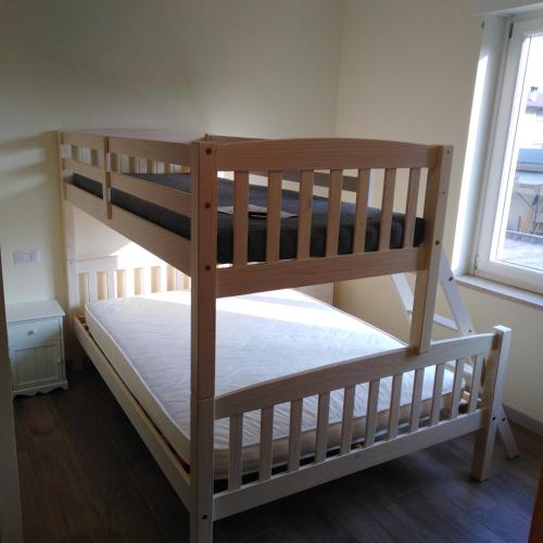 a couple of bunk beds in a room at LA CASA DEL GUARDIA in Lonedo