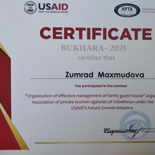 a sign for the usaid center foricteriology at Al-Bashir in Bukhara