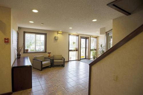 a hallway of a hospital with a waiting room at Americas Best Value Inn Greenbush Albany in East Greenbush