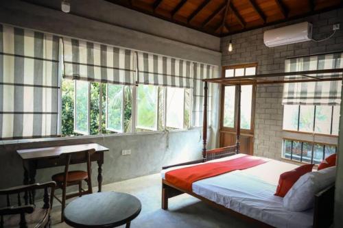 Una cama o camas en una habitación de Villa Wave Spice