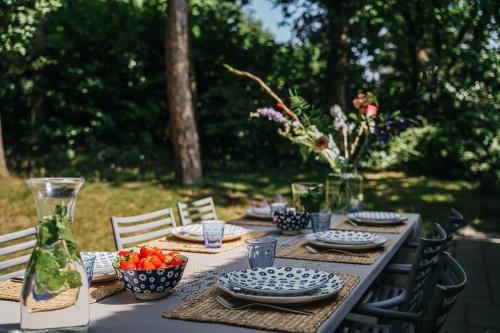 Κήπος έξω από το Cottage Hazenhorst - paradijs aan het bos