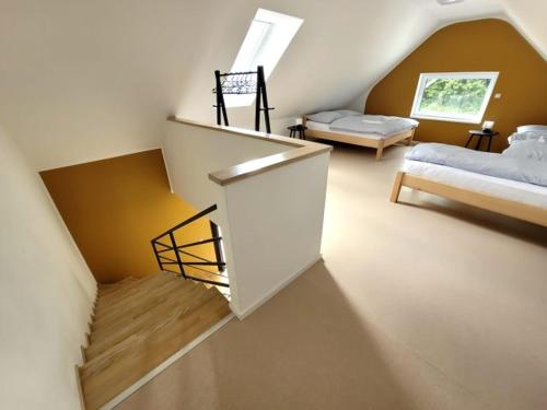 Postel nebo postele na pokoji v ubytování Apartmány U Jeskyní