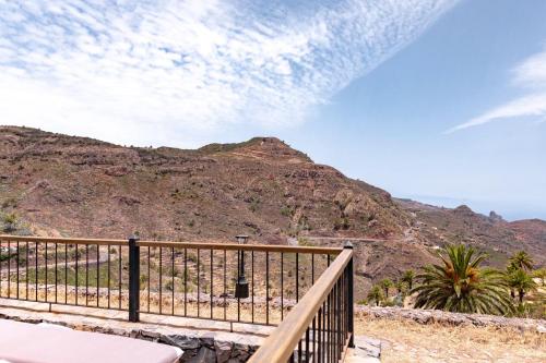 a balcony with a view of a mountain at Casa Rural La Palizada in Benchijigua