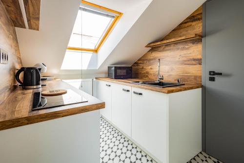 Kuchyň nebo kuchyňský kout v ubytování HighNest apartments
