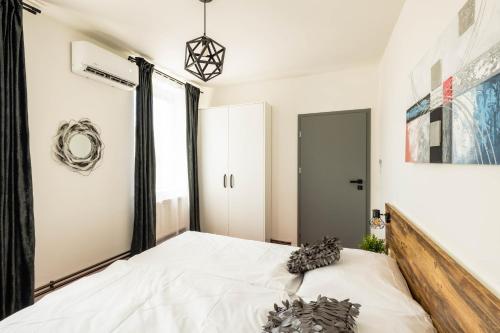 Postel nebo postele na pokoji v ubytování HighNest apartments