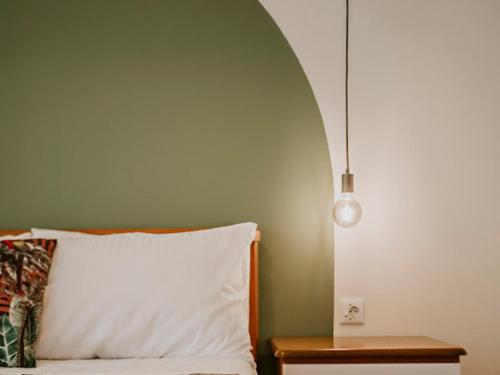 Posteľ alebo postele v izbe v ubytovaní Corfu Town SUNSHINE Apartment