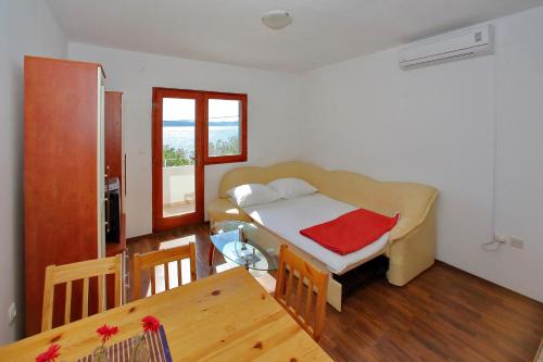 Postel nebo postele na pokoji v ubytování Apartment Bibinje 4197b