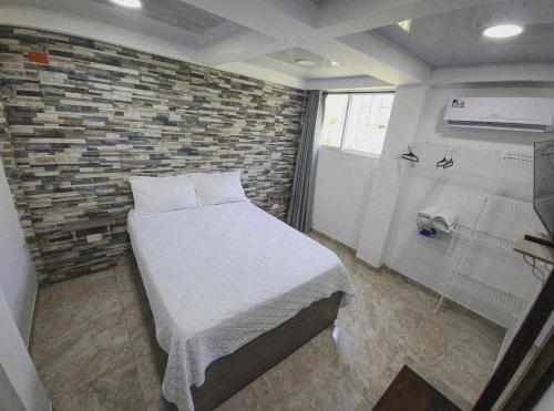 Tempat tidur dalam kamar di Apartamento Turistico Soul