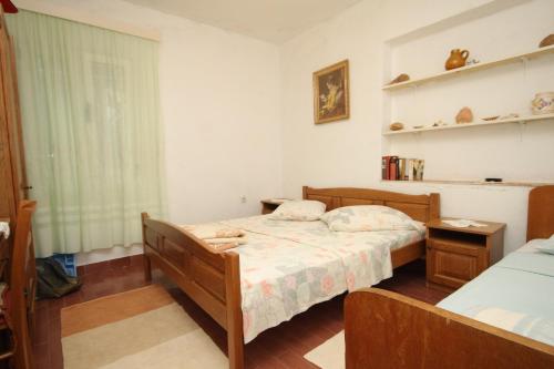 Posteľ alebo postele v izbe v ubytovaní Seaside secluded apartments Cove Smokvina, Hvar - 4036