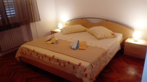 Postel nebo postele na pokoji v ubytování Apartment Supetarska Draga - Donja 2020a