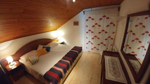 Posteľ alebo postele v izbe v ubytovaní Apartments by the sea Plat, Dubrovnik - 2136