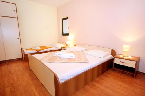 Posteľ alebo postele v izbe v ubytovaní Apartments by the sea Srebreno, Dubrovnik - 2146
