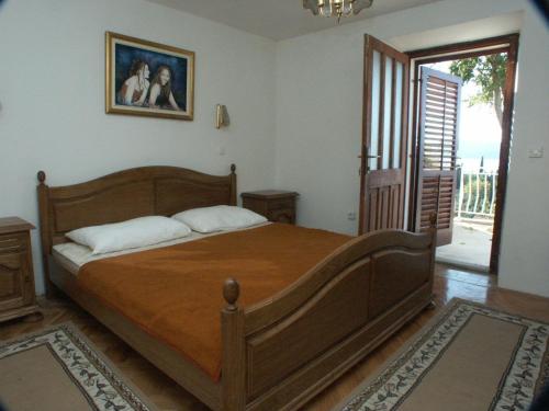 Posteľ alebo postele v izbe v ubytovaní Apartments by the sea Sladjenovici, Dubrovnik - 2162