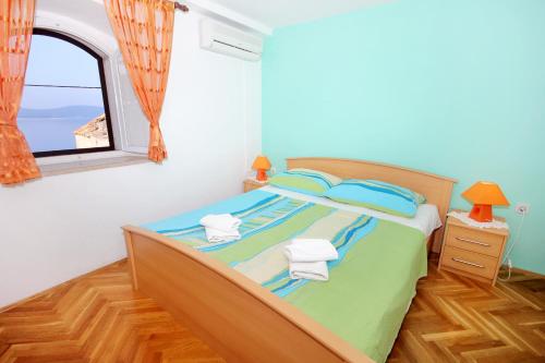 Postel nebo postele na pokoji v ubytování Seaside holiday house Sladjenovici, Dubrovnik - 2163